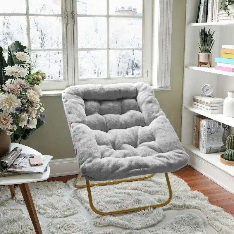 Faltbarer Oversize-Sessel mit Kunstfellbezug und Stahlrahmen