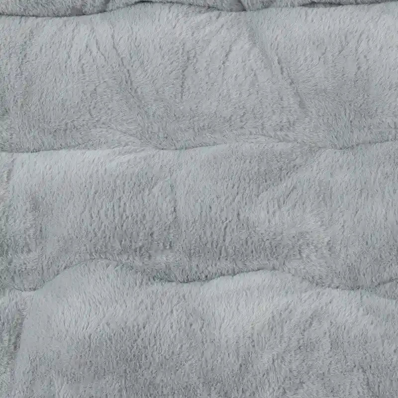 Faltbarer Oversize-Sessel mit Kunstfellbezug und Stahlrahmen